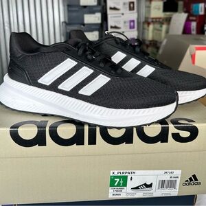 Adidas women’s size 7 1/2 - Black and White Sneakers